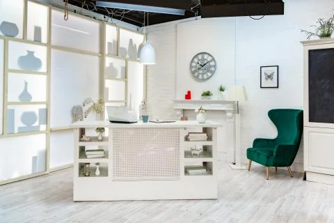 Modern white studio. with a light stand in the middle, with a special light on Stock Photos