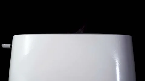           Modern white toaster with appear fried bread . Slow motion, close up Stock Footage 124845959