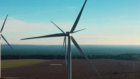 Modern wind energy infrastructure in countryside, aerial orbit Stock Footage 336961767
