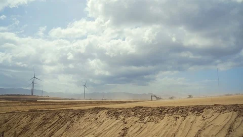 Modern Wind Farm and Large Quarry for Mining with Heavy Industrial Machinery. Stock Footage 119306375