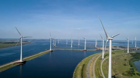 A Modern Wind Farm consisting of Wind Turbines with Two and Three Blades alon Stock Photos