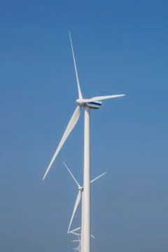 A Modern Wind Farm consisting of Wind Turbines with Two and Three Blades Stock Photos