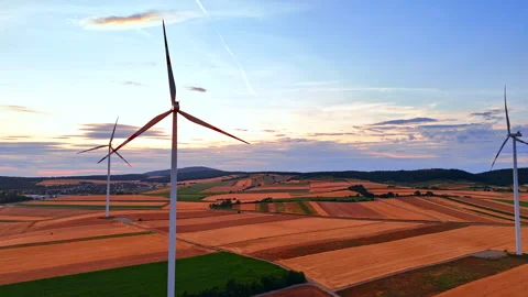 Modern wind generators standing in wide rural fields. High angle shot of Stock Footage 339017784