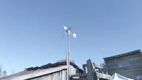 Modern Wind Mill on a Blue Sky Rotating Clean Energy 스톡 동영상 166479179