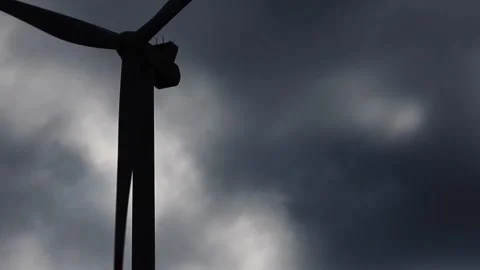 A modern wind turbine cloud shadow Stock Footage 149936895