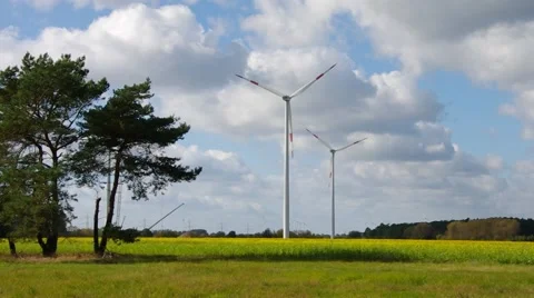 Modern Wind turbine in field Stock Footage 50748680