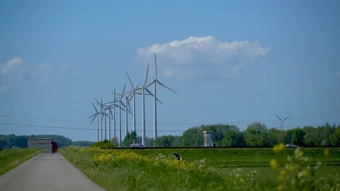 Modern windmill generation power at a Dutch landscape Stock Footage 89408449