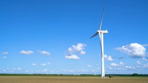 Modern windmill generation power at a Dutch landscape Stock Footage 89408460