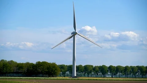 Modern windmill generation power at a Dutch landscape Stock Footage 89408485