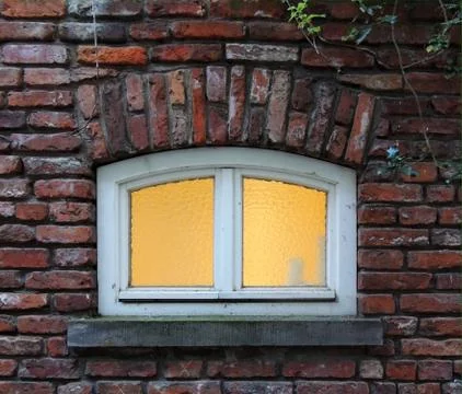 Modern window in old brick wall Stock Photos