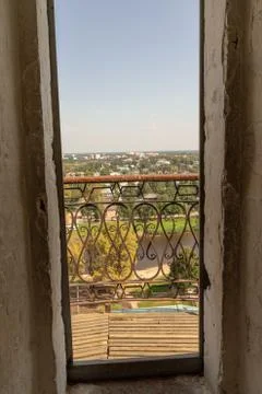Modern window with skyscraper view in brick wall Stock Photos