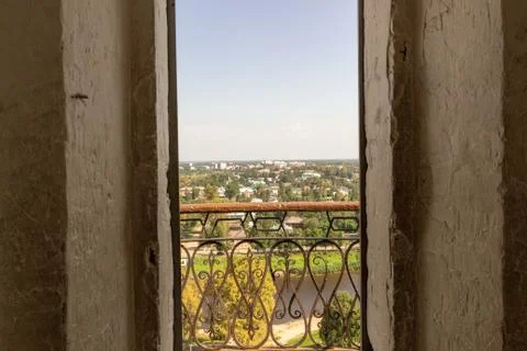Modern window with skyscraper view in brick wall Stock Photos