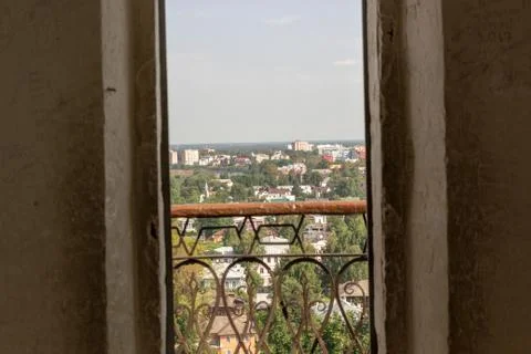 Modern window with skyscraper view in brick wall Foto stock