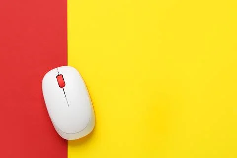 Modern wireless computer mouse on colorful background Stock Photos