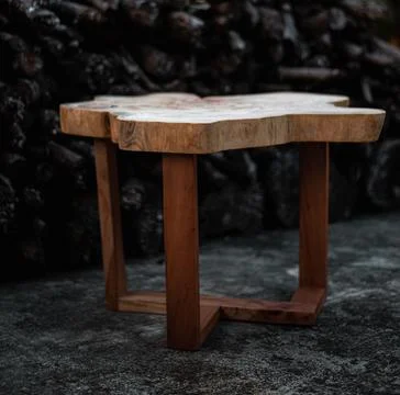 Modern wooden table with rectangular legs 스톡 사진
