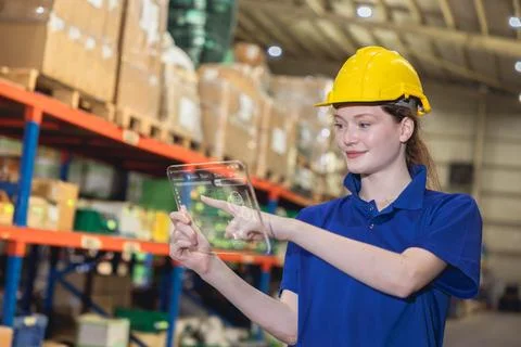 Modern worker using digital tablet device with logistics inventory manageme.. Stock Photos
