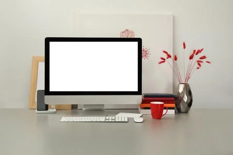 Modern workplace with computer and decor elements. Interior design Stock Photos