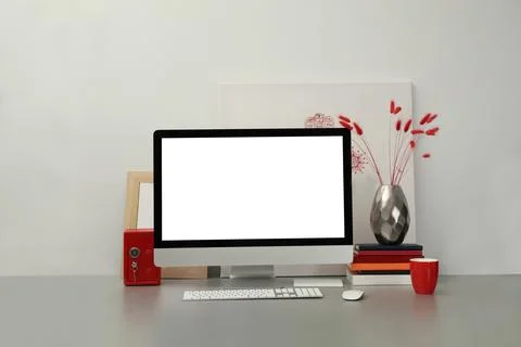 Modern workplace with computer and decor elements. Interior design Stock Photos