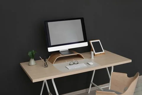 Modern workplace interior with computer on table. Space for text Stock-Fotos