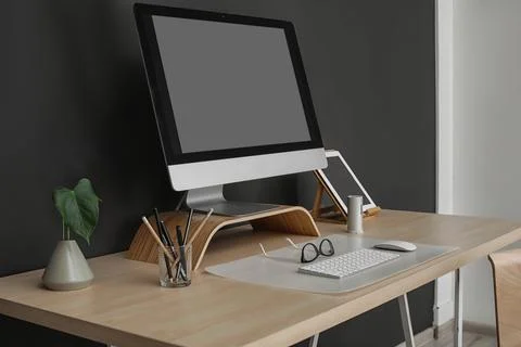 Modern workplace interior with computer on table. Space for text Stock-Fotos