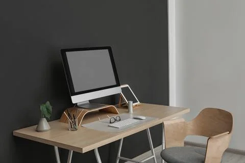 Modern workplace interior with computer on table. Space for text Stock-Fotos