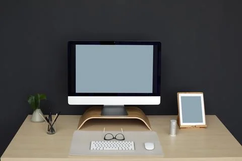 Modern workplace interior with computer on table. Space for text Stock-Fotos