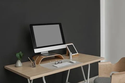 Modern workplace interior with computer on table. Space for text Stock-Fotos