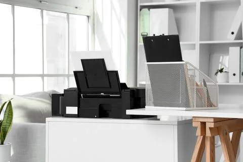 Modern workplace with printer in office Stock Photos