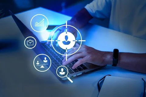 Modern workplace with user analytics and data visualization in focus during late Foto stock