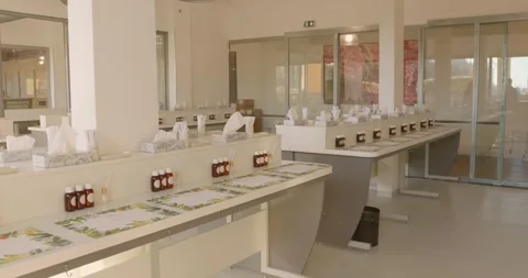Modern workshop interior with multiple mirrors and clean minimal design in Stock Footage 333182469