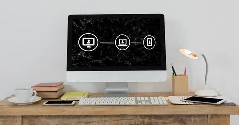 Modern workspace with computer displaying digital interface icons on wooden desk Illustrazione stock