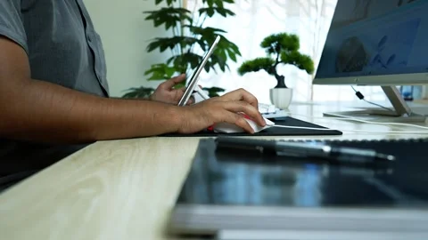 Modern Workspace with Tablet and Computer Stock Footage 317737129
