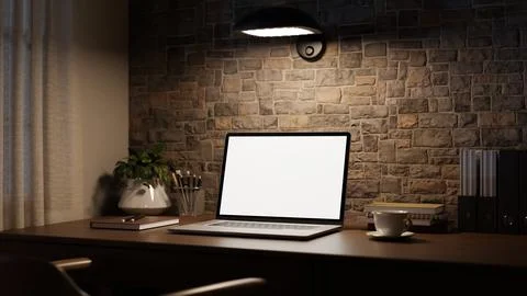 Modern workspace with white screen laptop and coffee on table beside brick .. 스톡 일러스트