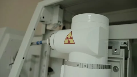 Modern X-ray machine in the X-ray room procedure room. Carrying out diagnostic Stock Footage 317807061