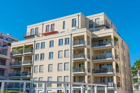 Modern yellow apartment house Stock Photos