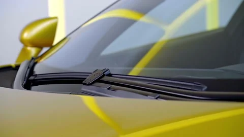 Modern yellow supercar windshield close up Stock Footage 144688083