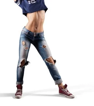 Modern young beautiful dancer posing on a studio background Stock Photos