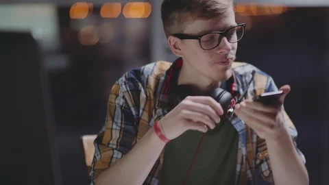 A modern young creative man plays with a pen, twists in his hands Stock Footage 87160992