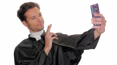 Modern young priest taking a selfie 스톡 동영상 45864529
