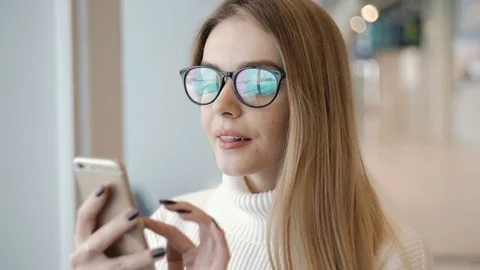 Modern young woman using technologies Stock Footage 71820627