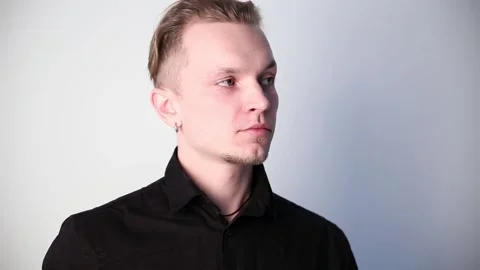 Modern youth. young guy posing in front of camera. concept of success. Vidéo 87457570