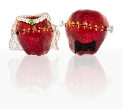 Modified apples in wedding garb Stock Photos