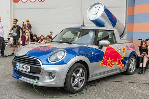 Modified blue Mini Cooper with Red Bull branding at an event or show - Kyiv.. Stock Photos