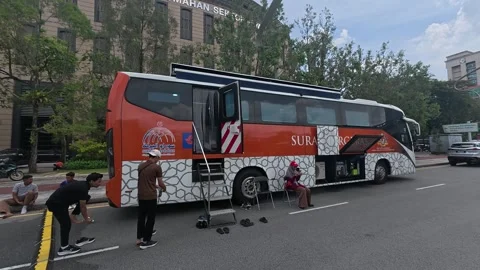 Modified Bus Converted Into a Mobile Surau for Event Public Prayer Stock Footage 336645245