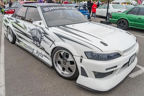 A modified hatchback car with performance or racing modifications, featurin.. Stock Photos