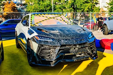 Modified matte black car with orange accents, aggressive design elements, a.. 库存照片