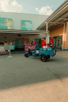 Modified motorcycle delivery vehicle, at MATHAF, a halal food festival Stock Photos
