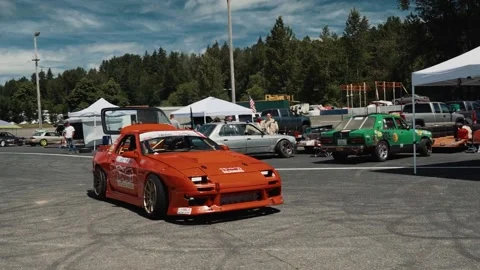Modified Red 1988 Mazda RX7 FC Driving i... | Stock Video | Pond5