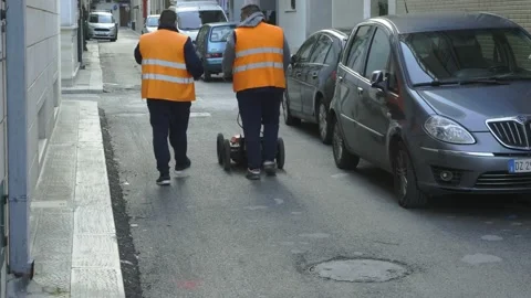 Modugno, Italy - December 2020: technicians use GPR to identify the undergrou Stock-Footage 154650971