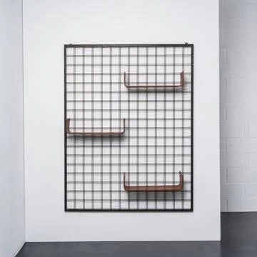 Modular wall bookcase with metal structure Stock Photos